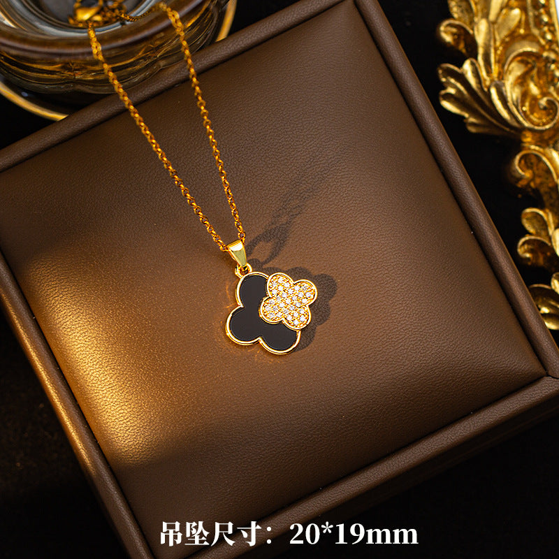 Copper inlaid zirconium four-leaf clover necklace for women, titanium steel real gold plating popularinsfashion flower exquisite sweater chain jewelry