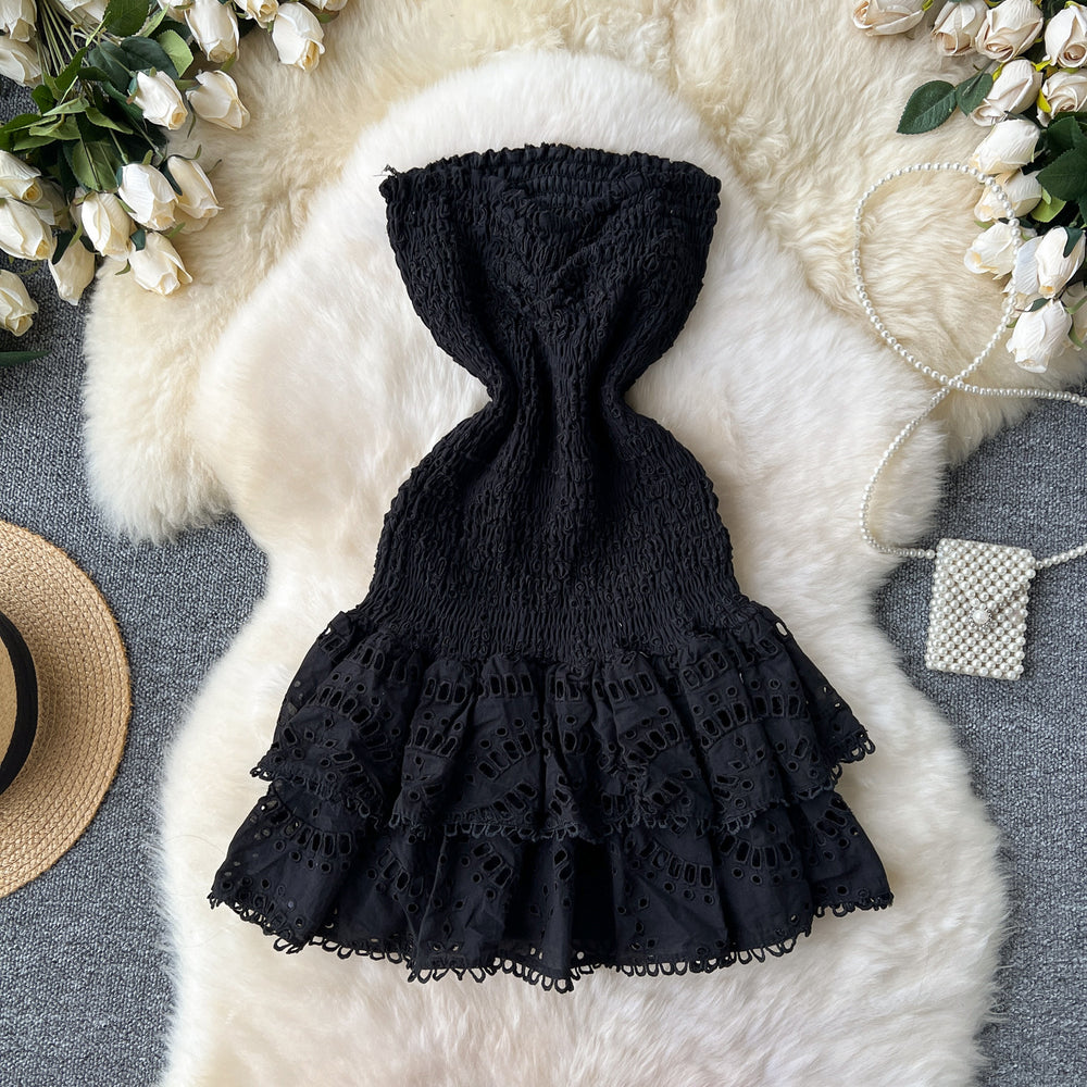 New women's vacation dress: designer ruched sleeveless bandeau dress with cinched waist, slimming cutout embroidery, and ruffle hem