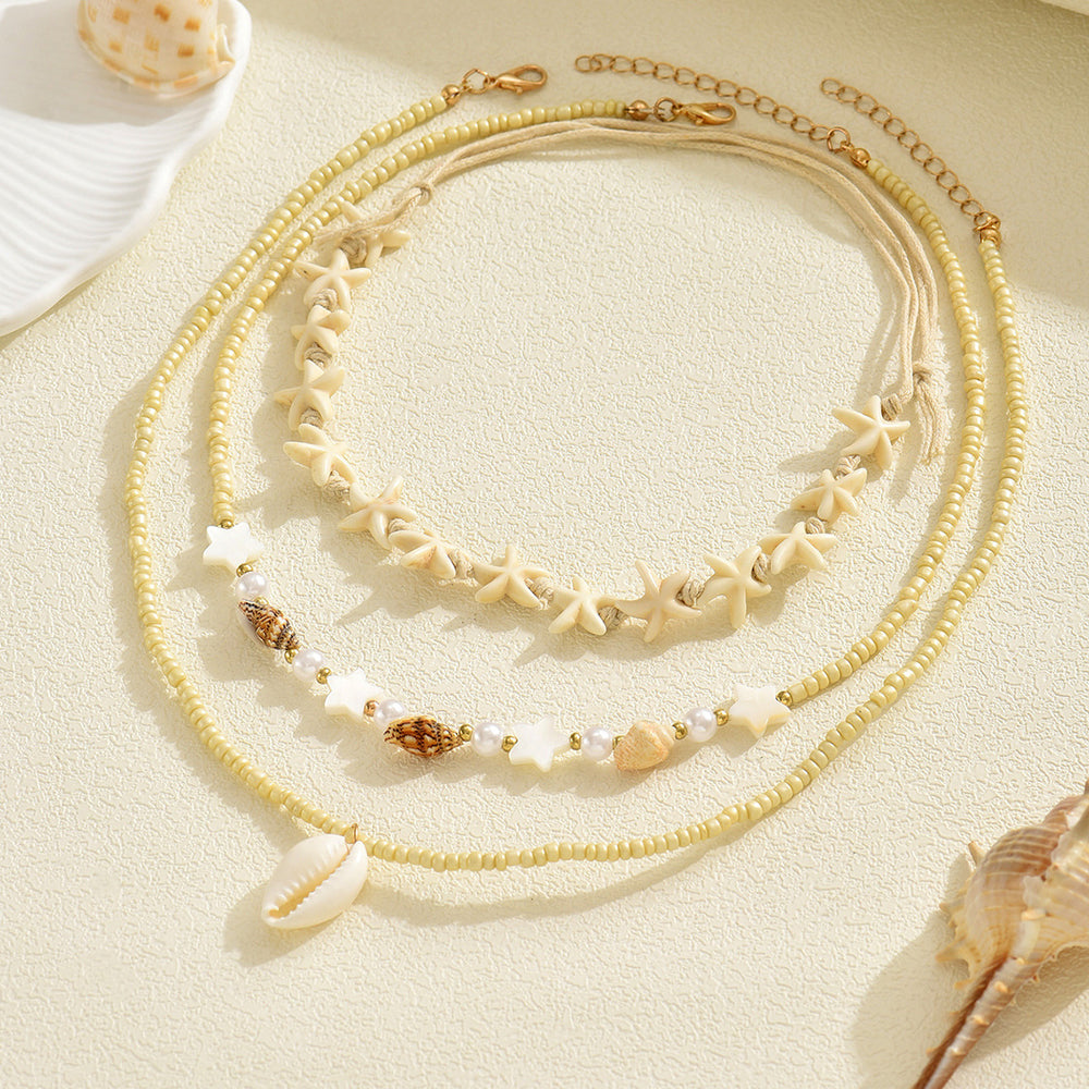 Wholesale autumn/winter sweater necklaces: european & american cross-border style - ocean-inspired starfish & seashell jewelry, subtly luxurious, niche design, stackable pearl chokers