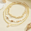 Wholesale autumn/winter sweater necklaces: european & american cross-border style - ocean-inspired starfish & seashell jewelry, subtly luxurious, niche design, stackable pearl chokers