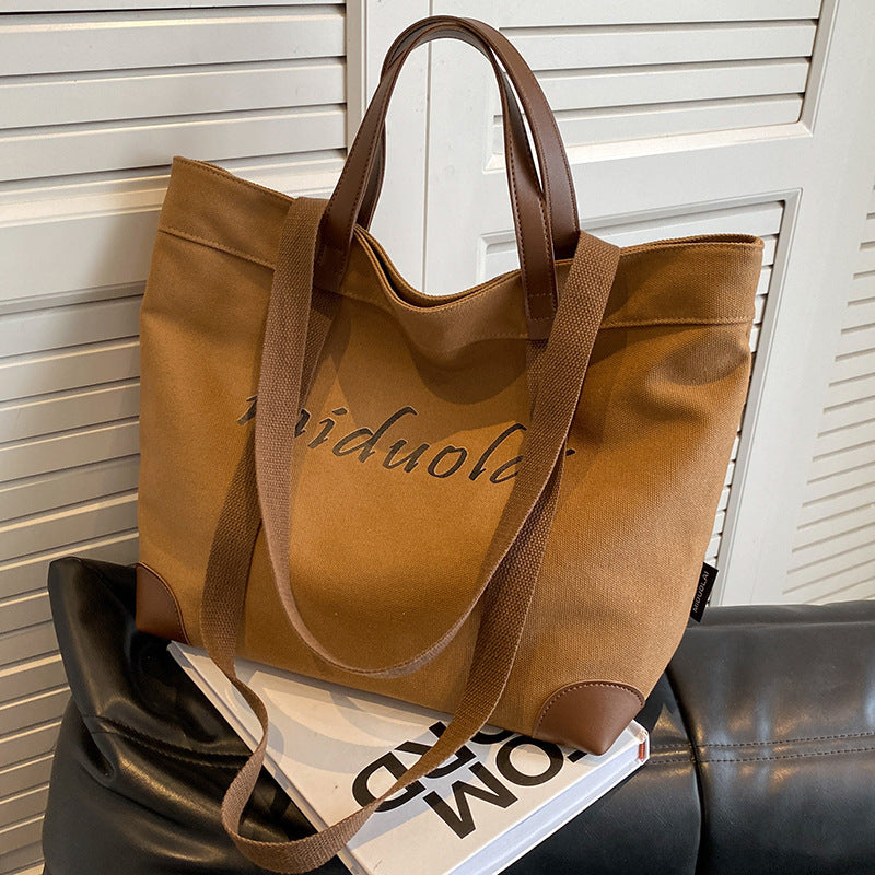 Canvas bag women's large-capacity 2023 new summer versatile simple shoulder bag cloth bag class commuter tote bag