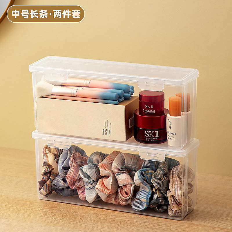 Long makeup brush, mask storage box, transparent rectangular box with lid, covered dresser, skin care product storage box.