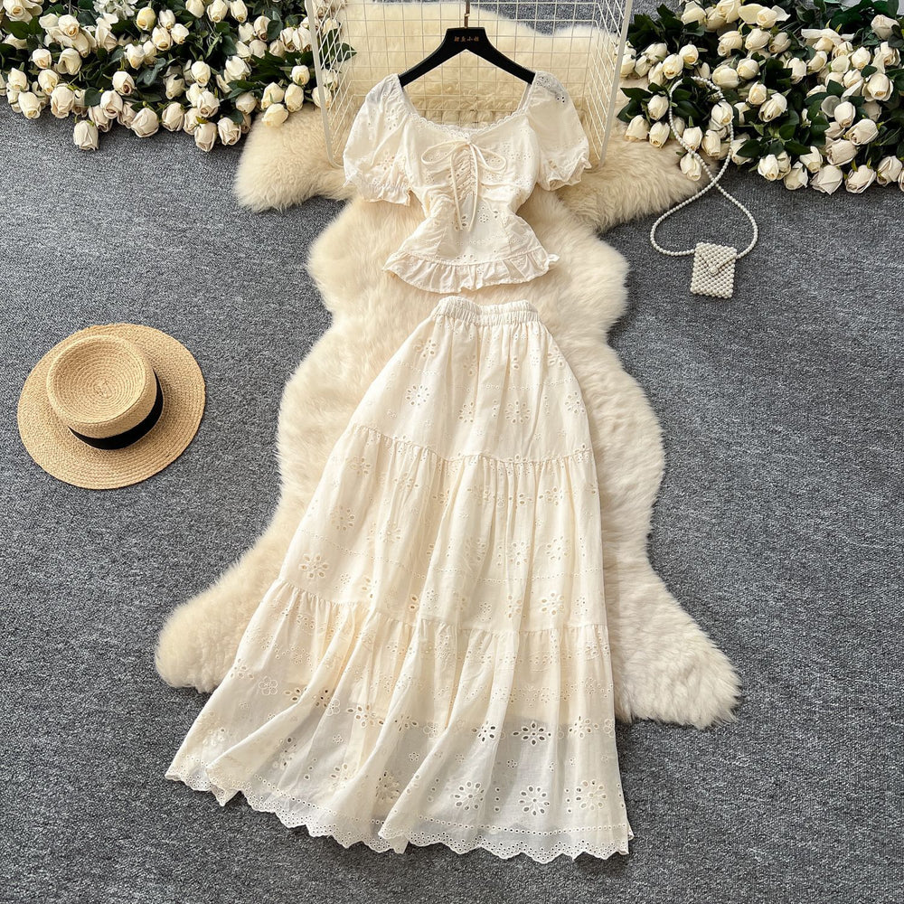 French chic outfit: women's cinched-waist square neck puff sleeve blouse with high-waisted cutout embroidered midi skirt - perfect for vacation