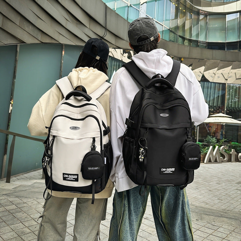 New large-capacity backpack, animation pattern graffiti, student schoolbag, trendy casual backpack, commuter bag, men's and women's models