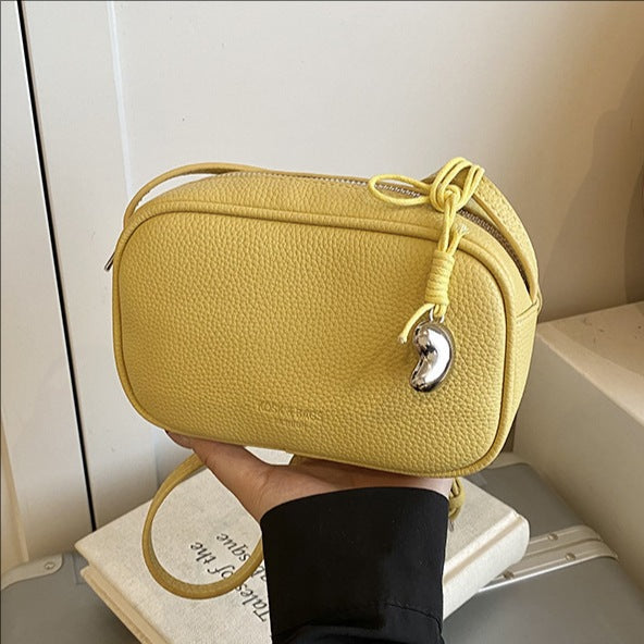 Cross-border high-end fashion foreign-style pillow bag women's 2025 new lychee pattern simple solid color shoulder messenger bag