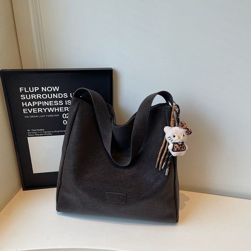 Large capacity retro handbag for women, trendy 2025 new arrival, minimalist versatile soft shoulder bag, high-end commuter tote bag