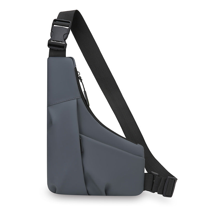 New men's light and close-fitting triangular bag, simple leather film texture shoulder messenger bag, trendy and cool casual portable breast bag