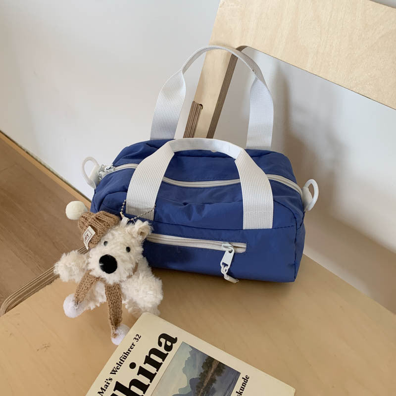 Foreign trade Japanese light casual nylon cloth portable small bag women's 2025 new shoulder messenger bag bowling bag