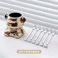 Golden bear fruit fork jar + six silver forks