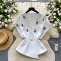 Elegant chanel-inspired, high-end, meticulously crafted, diamond-studded v-neck, short-sleeved, waist-cinching jacket for women. a chic and sophisticated french-style blazer vest, perfect for winter