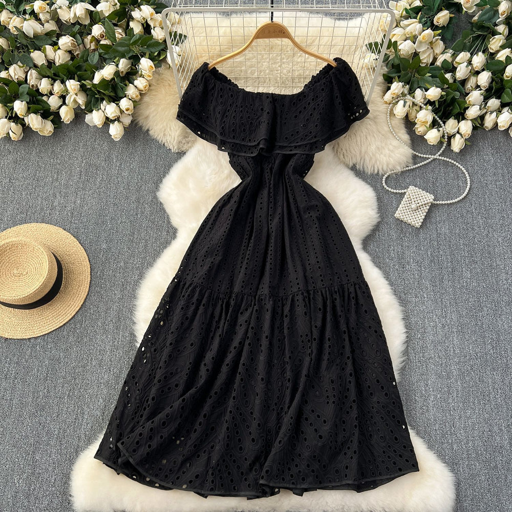 Elegant, sophisticated, and effortlessly chic: this ruffled, off-the-shoulder, lace-embroidered, and cutout maxi dress is perfect for a glamorous beach vacation