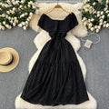 Elegant, sophisticated, and effortlessly chic: this ruffled, off-the-shoulder, lace-embroidered, and cutout maxi dress is perfect for a glamorous beach vacation