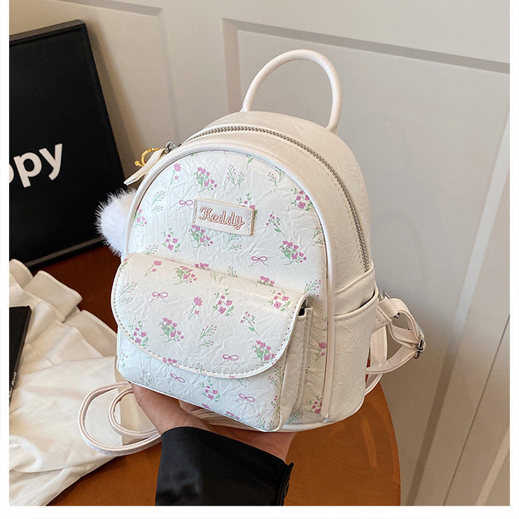 Cross-border backpack women's fashion versatile niche design Korean version student schoolbag casual texture lightweight travel backpack