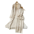 Elegant and chic: oversized knit cardigan with midi length + sleeveless bodycon dress with metallic buckle detail