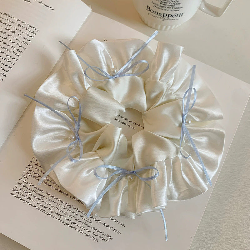 Sweet ballet style satin bow scrunchie - perfect for ponytails, buns, and hair ties