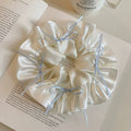 Sweet ballet style satin bow scrunchie - perfect for ponytails, buns, and hair ties