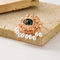 Wholesale vintage rings: european & american cross-border jewelry - devil's eye, luxury, niche, statement pearl open ring accessories