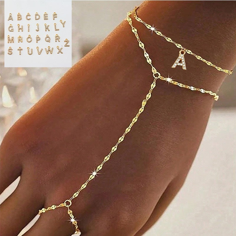 Exquisite new gold-tone chain and trendy ring stainless steel bracelet for women, designed with a chic and individualistic flair