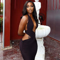 Fashion style cross-border street pure color women's clothing pleated hip-covering one-step skirt low-cut silm halterslimming look long dress