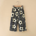 For pre-orders, please contact customer service. - pants: black background with white floral print