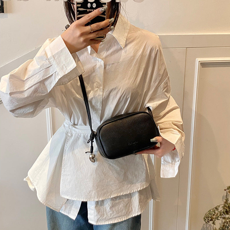 Cross-border high-end fashion foreign-style pillow bag women's 2025 new lychee pattern simple solid color shoulder messenger bag