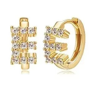 European and american jewelry: ear cuffs, diamond-studded small hoop earrings, stud earrings, and ear bone rings