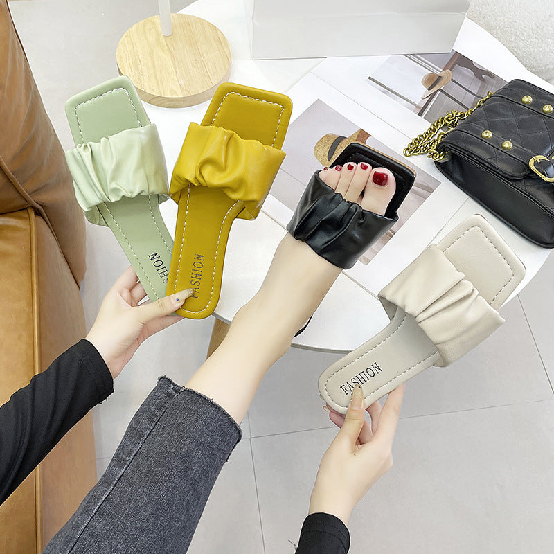 Flat-heeled slippers women's new summer 2020 Korean version outer wear fashion pleated sandals square head fairy style one-word slippers