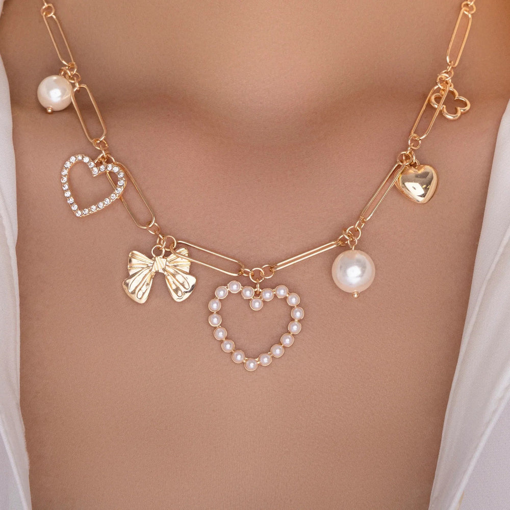 European and american cross-border metal cold style heart bow necklace women's fashion accessible luxury diamond inlaid cut outfall and wintersweater chain
