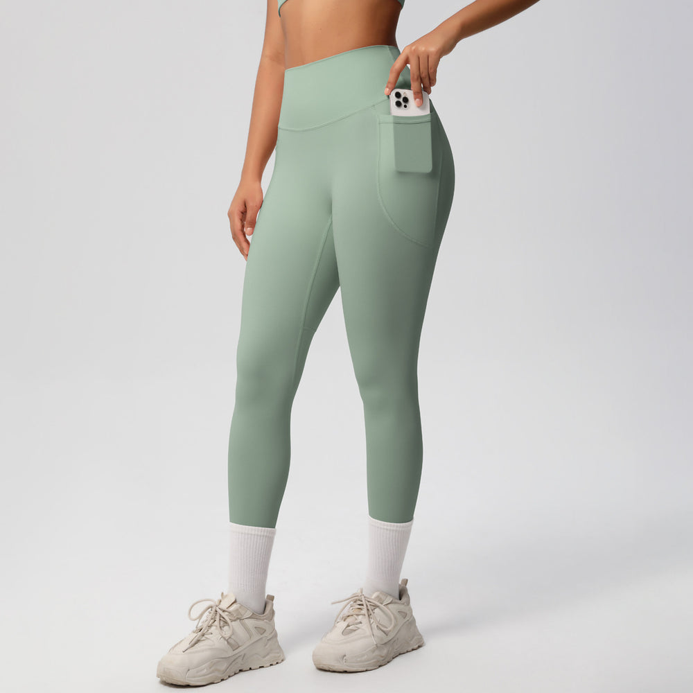 new arrivalhigh waist hip lifting tight yoga pants nude quick-drying flap pocket pants outdoor running fitness sports pants