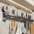 Kitchen suction cup storage rack, punch-free hook, hanging rod, spatula cover, spoon, knife all-in-one hanging rack, cutting board storage rack