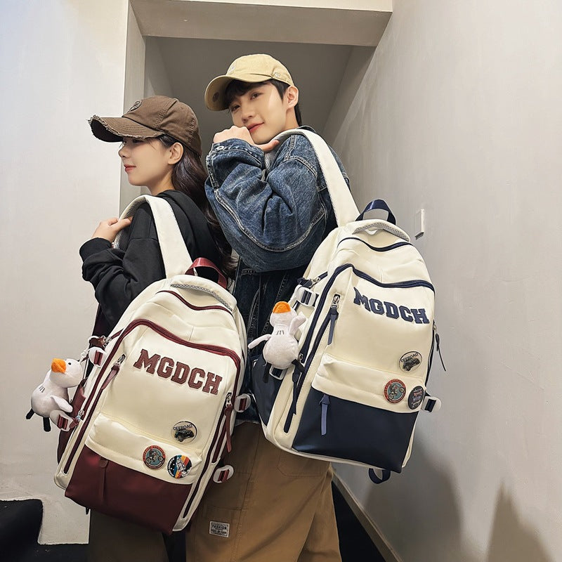 New middle and high school students backpack large capacity lightweight weight backpack simple and strong anti-splashing backpack