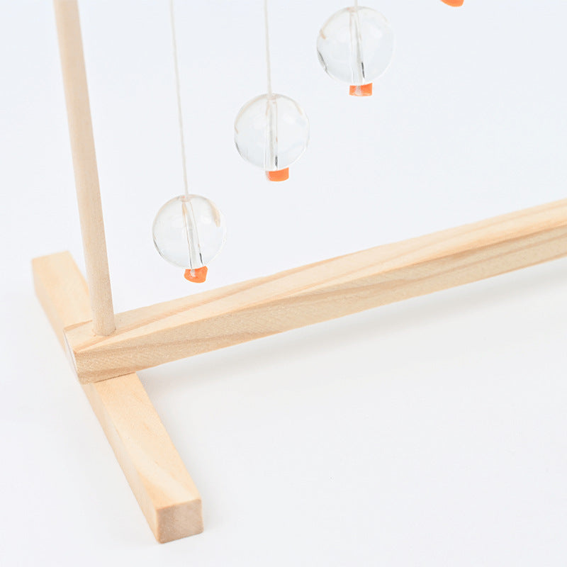 Serpentine pendulum law of conservation of energy handmade DIY technology small production students invent STEAM teaching aids classroom experiment