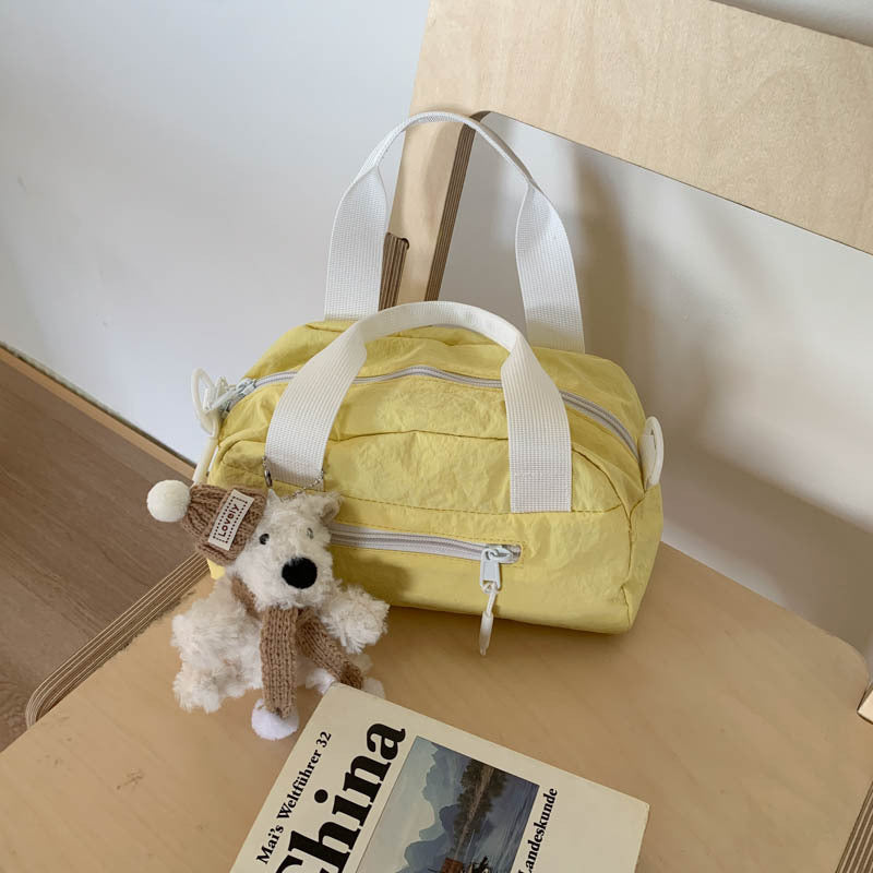 Foreign trade Japanese light casual nylon cloth portable small bag women's 2025 new shoulder messenger bag bowling bag