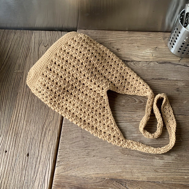 New fashionable solid color knitted hollow large-capacity shoulder bag Korean handmade tote bag holiday wind beach women's bag