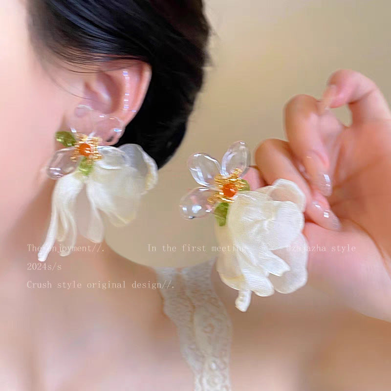 Vacation-ready, ethereal yellow floral earrings for women - new 2026 collection. perfect for beach getaways, these unique and bold statement earrings are sure to turn heads