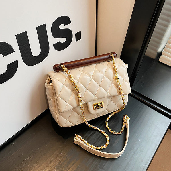Niche high-end fashion bag women's new 2025 solid color Xiaoxiangfeng diamond chain bag versatile shoulder bag