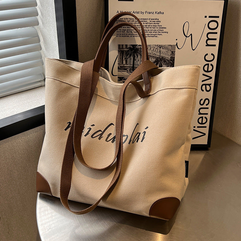Canvas bag women's large-capacity 2023 new summer versatile simple shoulder bag cloth bag class commuter tote bag