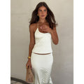 European and american women's clothing  spring new sexy backless u-neck solid color camisole top and elegant midi skirt set
