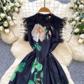 High-end women's dress:  summer collection - sophisticated, niche design, slimming, printed maxi dress with a cinched waist and flowing skirt