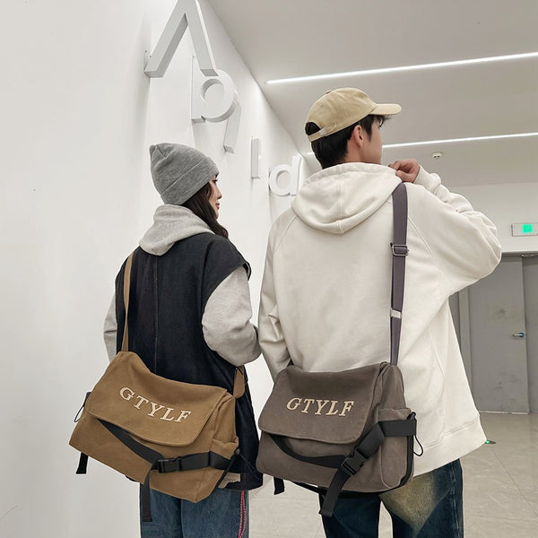 Student messenger bag men's high-end niche canvas bag large capacity women's fashion new shoulder bag backpack