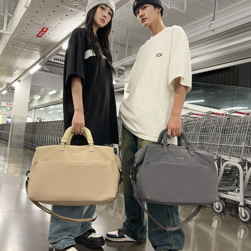Foreign trade foldable duffel bag bag dry and wet separation messenger bag simple wear-resistant anti-splashing light short-distance bag wholesale