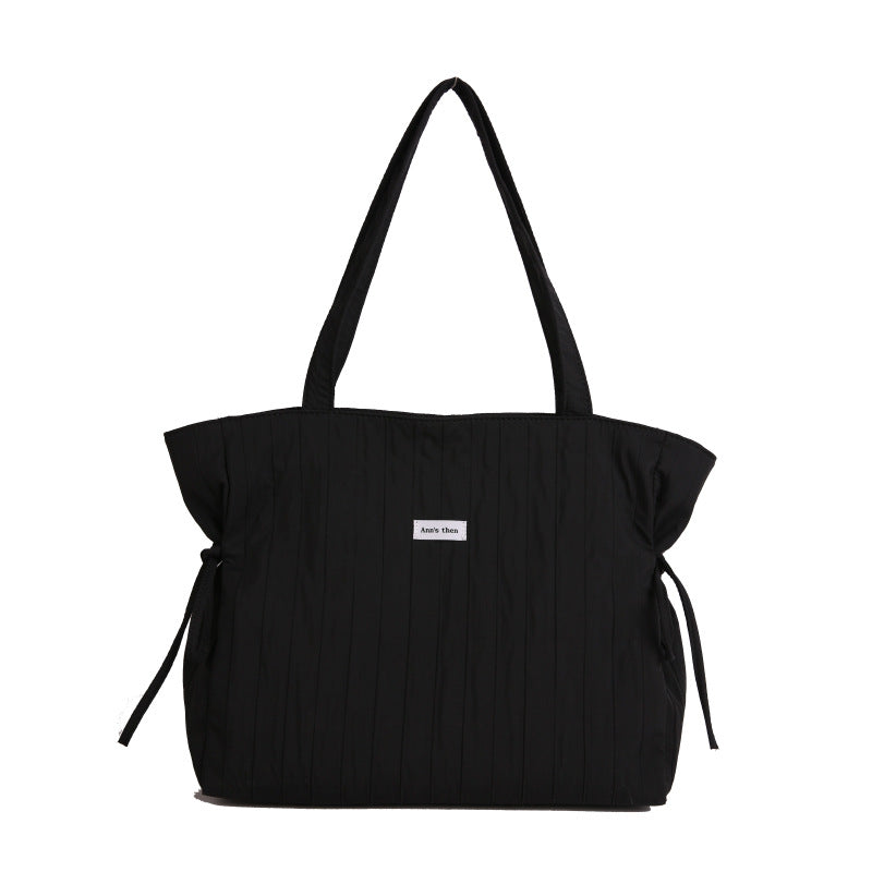 Cross-border casual tote bag, simple personality and large capacity fashion women 2025 summer commuting lazy wind messenger bag women