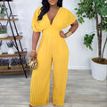 C8592  foreign trade  new european and american cross-border fashion v-neck high-waisted solid color sexy pleated jumpsuit