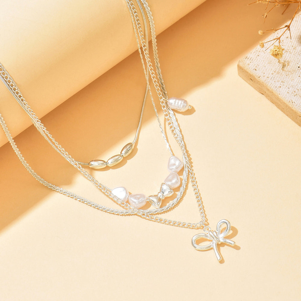 Wholesale bowknot choker necklaces - european & american style, multi-layered layered accessories, niche faux pearl, light luxury, high-end necklaces