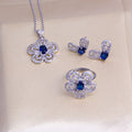 Women's jewelry set: sea blue gemstone flower necklace, earrings, and ring set - minimalist, stylish, and luxurious titanium steel pendant