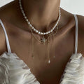 Bohemian pearl necklace wholesale fashion cross-border hot style jewelry stylish tassel alloy six-pointed clavicle chain for women