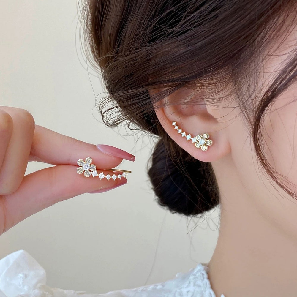 Korean-style exquisite diamond-studded flower stud earrings with an integrated ear row design. a touch of luxury, elegant and chic. trending influencer-approved accessories
