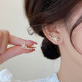 Korean-style exquisite diamond-studded flower stud earrings with an integrated ear row design. a touch of luxury, elegant and chic. trending influencer-approved accessories