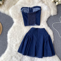 Sweet and edgy girl's summer outfit: cropped denim tube top and high-waisted a-line skirt set