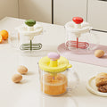 Multifunctional hand mixer with built-in whisk, press-down filter, and egg beater – perfect for cream whipping and baking